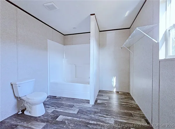 a view of a bathroom with a sink and a toilet