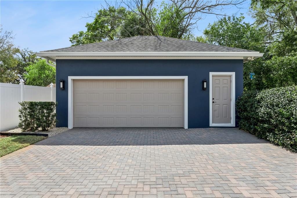 352 Moonbeam Loop Oviedo, FL 32765 - Photo 45 of 64 a front view of a house with garage