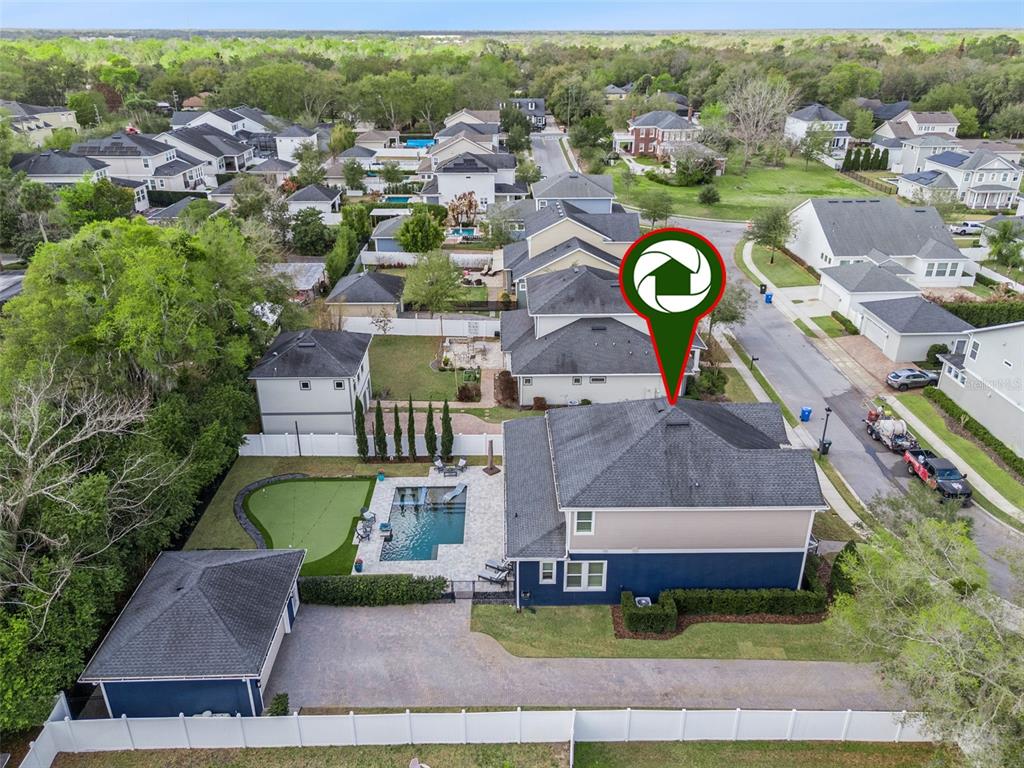 352 Moonbeam Loop Oviedo, FL 32765 - Photo 51 of 64 an aerial view of a house with a swimming pool yard and outdoor seating
