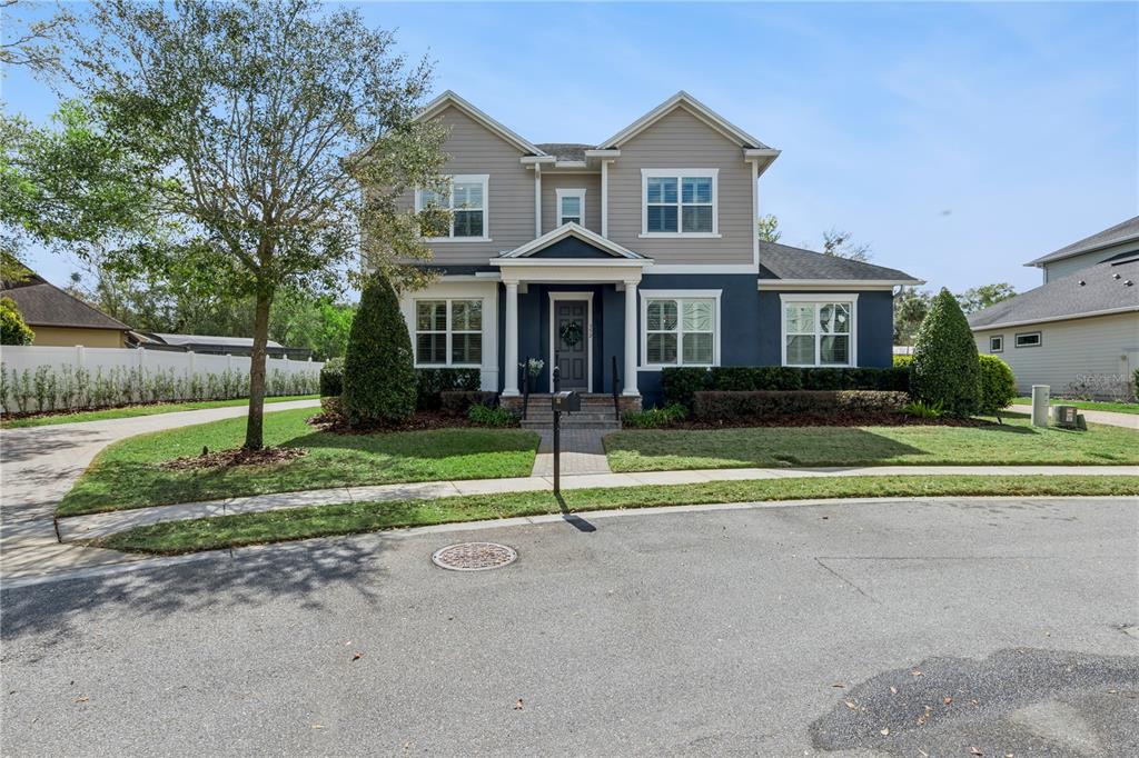 352 Moonbeam Loop Oviedo, FL 32765 - Photo 60 of 64 a front view of house with yard and green space