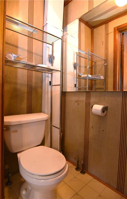 613 East 19th Avenue Homestead, PA 15120 - Photo 18 of 33 a bathroom with a toilet and a shower