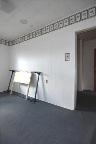 a bathroom with a granite countertop toilet a sink and bathtub