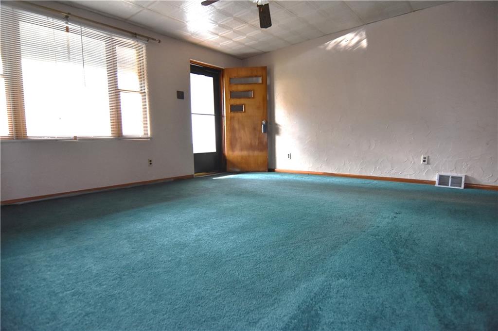 613 East 19th Avenue Homestead, PA 15120 - Photo 3 of 33 a view of an empty room with a window