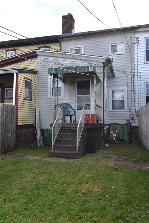 613 East 19th Avenue Homestead, PA 15120 - Photo 33 of 33 a front view of house with yard