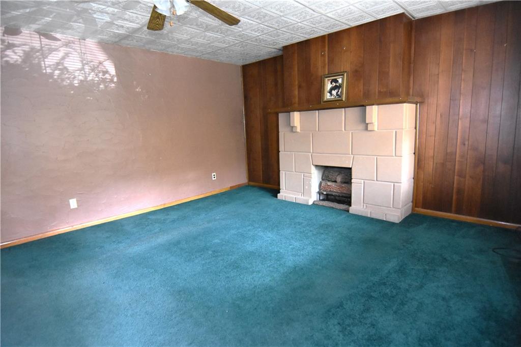 613 East 19th Avenue Homestead, PA 15120 - Photo 5 of 33 a view of a livingroom with a kitchen