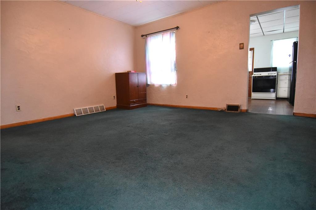 613 East 19th Avenue Homestead, PA 15120 - Photo 10 of 33 a view of an empty room with a window