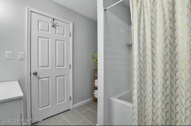 a bathroom with a bathtub