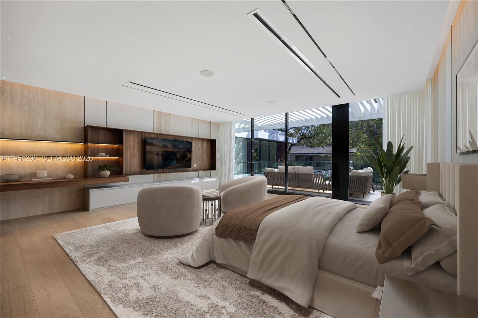 3210 Coacoochee Street Miami, FL 33133 - Photo 12 of 29 a bedroom with a bed a couch and potted plant