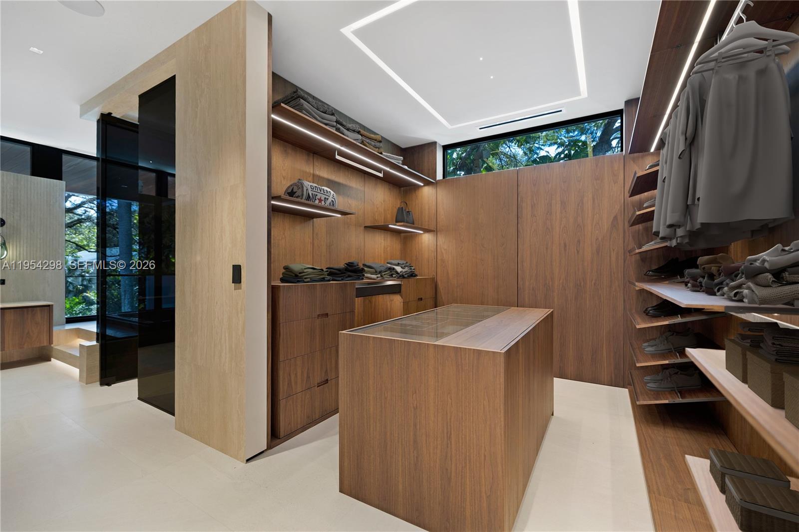 3210 Coacoochee Street Miami, FL 33133 - Photo 19 of 29 a kitchen with stainless steel appliances a refrigerator and a stove
