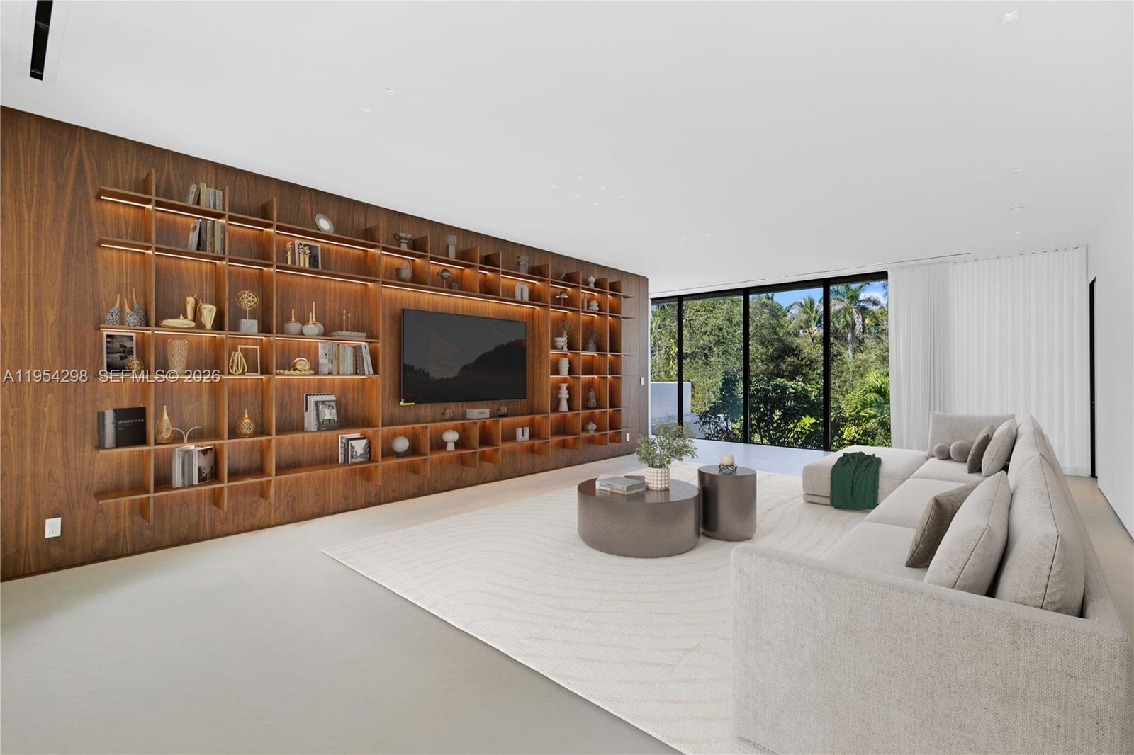 3210 Coacoochee Street Miami, FL 33133 - Photo 10 of 29 a living room with furniture a flat screen tv and a large window