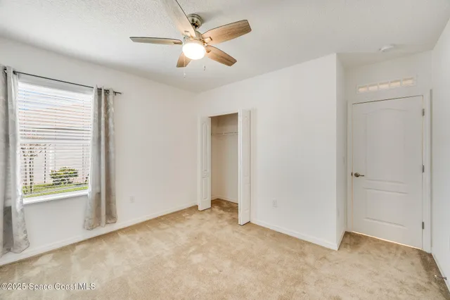 a view of hallway with stairs