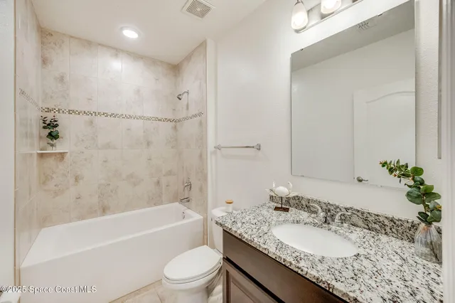 a view of yard with patio