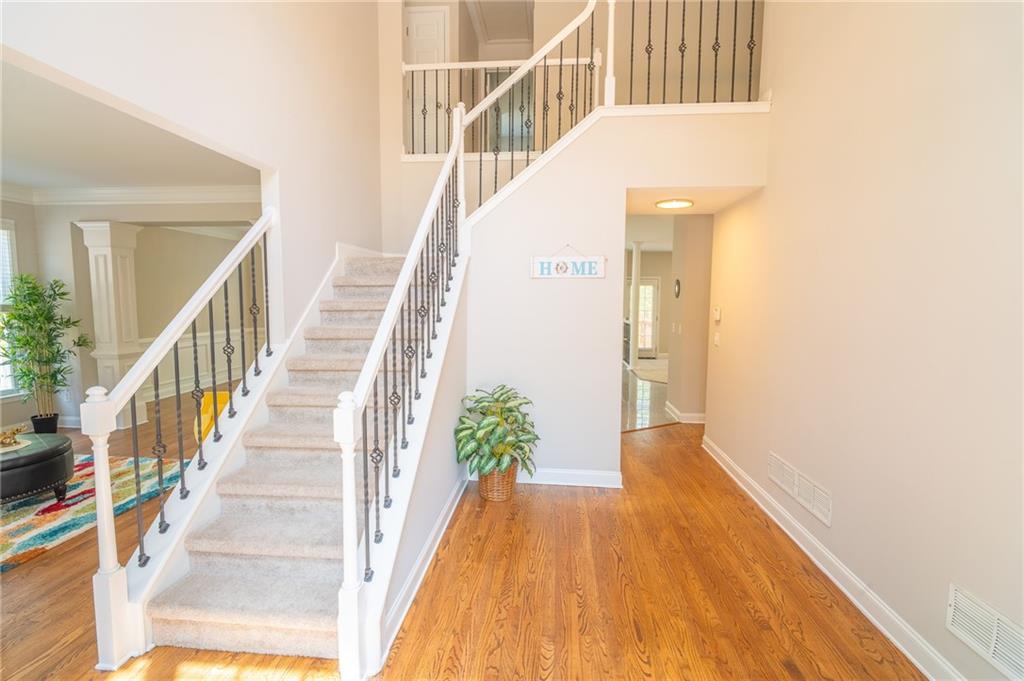 3819 Meandering Way Southwest Lilburn, GA 30047 - Photo 3 of 27 a view of entryway with wooden floor
