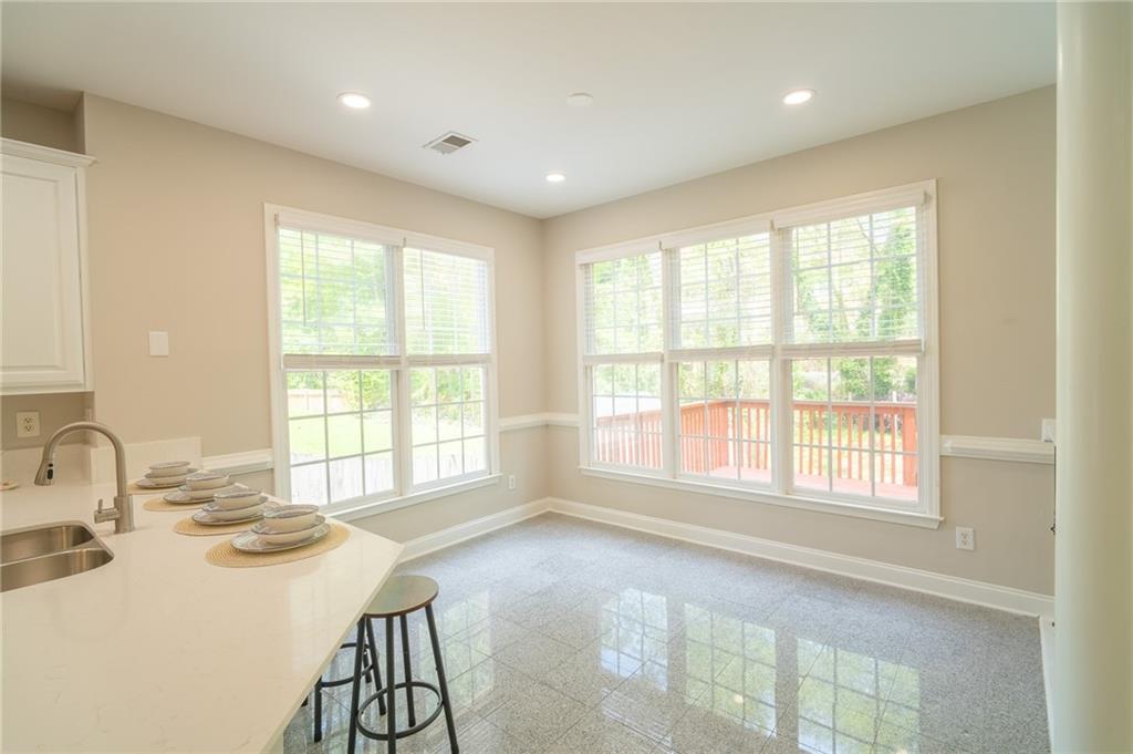 3819 Meandering Way Southwest Lilburn, GA 30047 - Photo 9 of 27 a view of a kitchen and a window