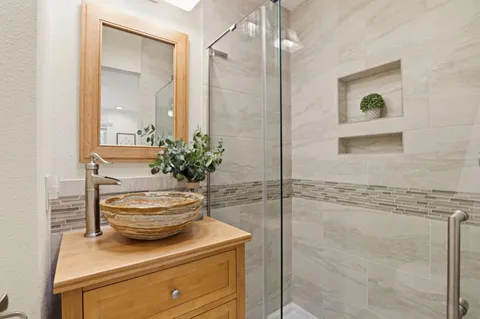 a view of bathroom with a potted plant