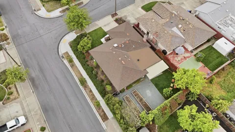 aerial view of a house with a garden