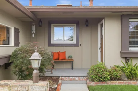 a front view of a house with yard