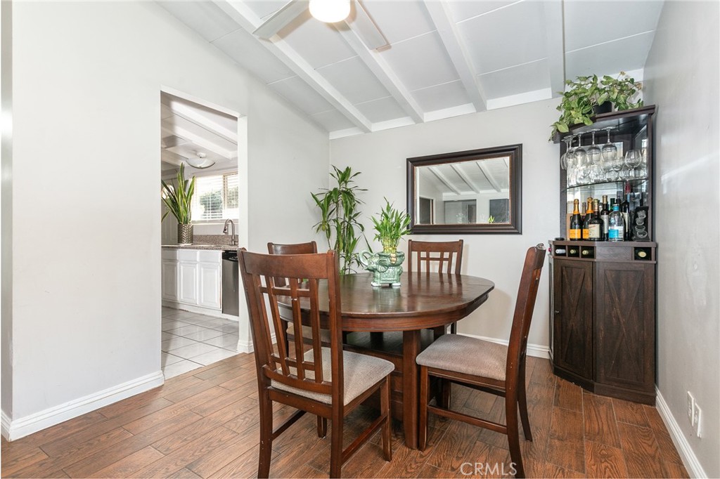 20626 Haynes Street Winnetka, CA 91306 - Photo 22 of 28 a dining room with furniture and window