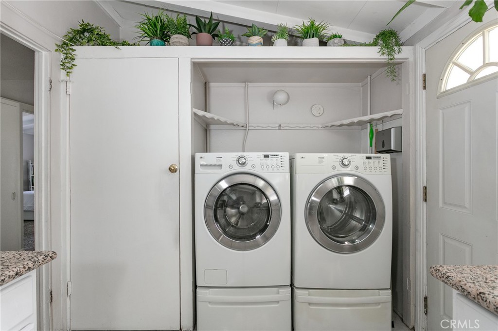 20626 Haynes Street Winnetka, CA 91306 - Photo 24 of 28 a utility room with dryer and washer