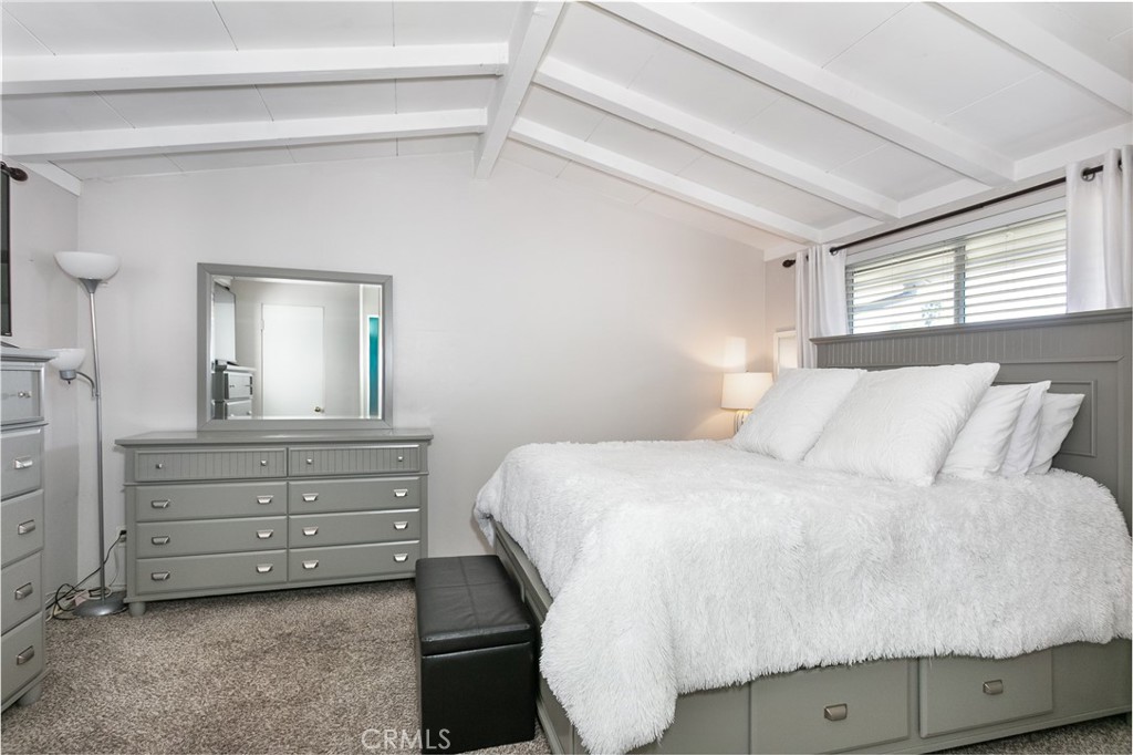 20626 Haynes Street Winnetka, CA 91306 - Photo 10 of 28 a bedroom with a bed and a dresser