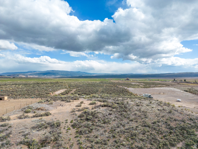 1400 East Highline Road, Unit 1 Loa, UT 84747 - Photo 10 of 17 Aerial view of sparsely populated area featuring a mountainous background
