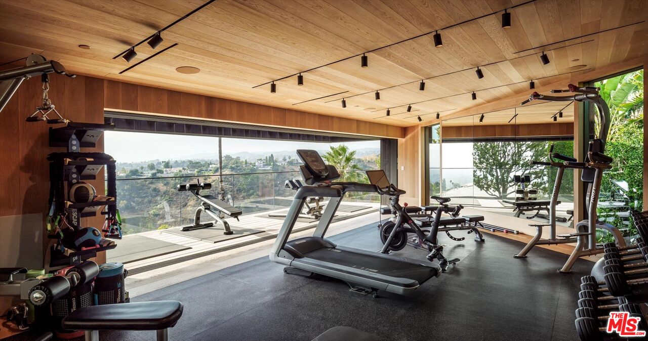 1663 Summitridge Drive Beverly Hills, CA 90210 - Photo 21 of 22 a view of a room with gym equipment