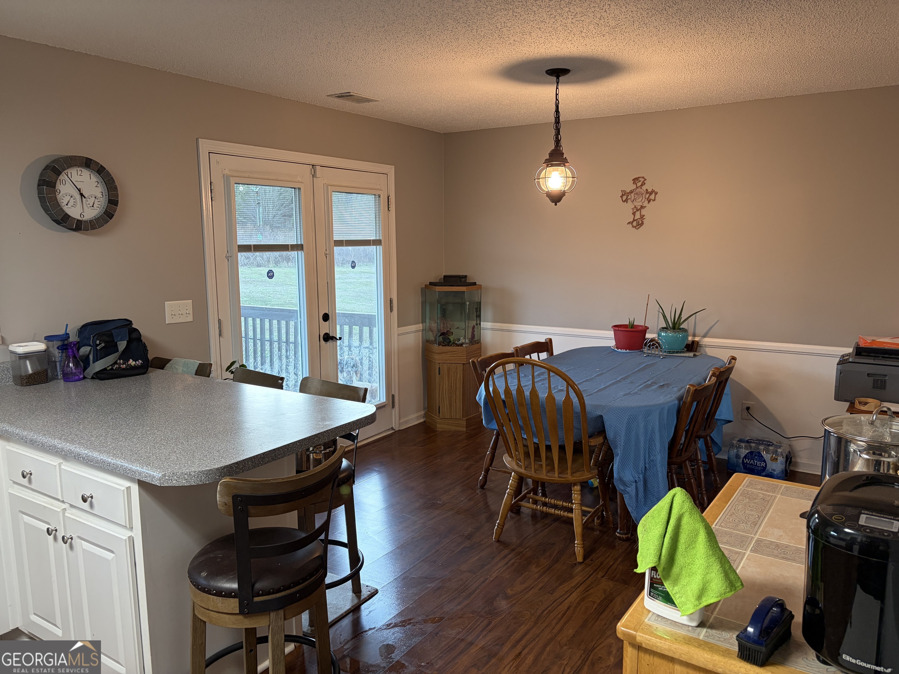 137 Stonebrooke Drive Colbert, GA 30628 - Photo 16 of 47 a view of a dining room with furniture and wooden floor