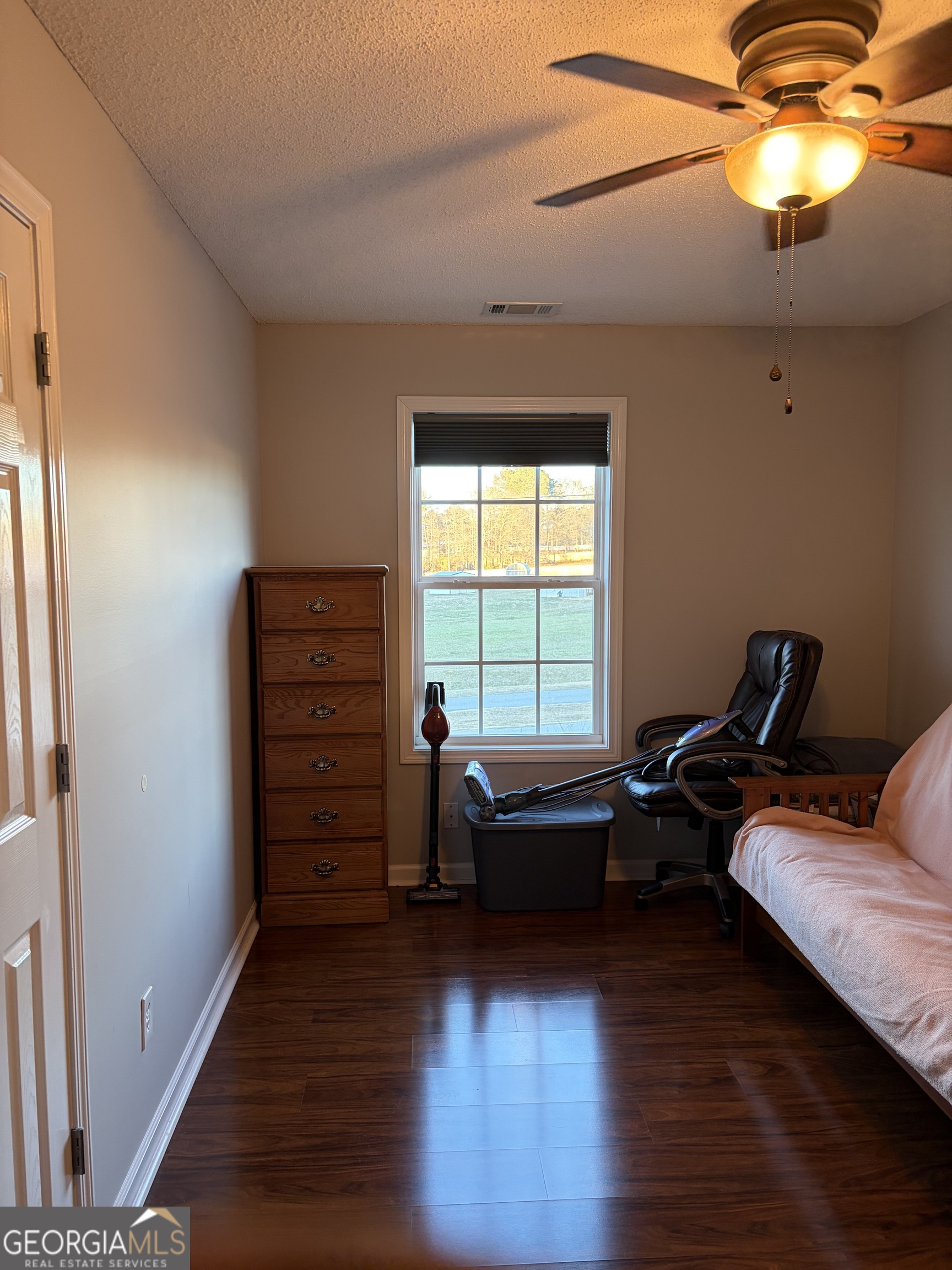 137 Stonebrooke Drive Colbert, GA 30628 - Photo 29 of 47 a living room with furniture and a window