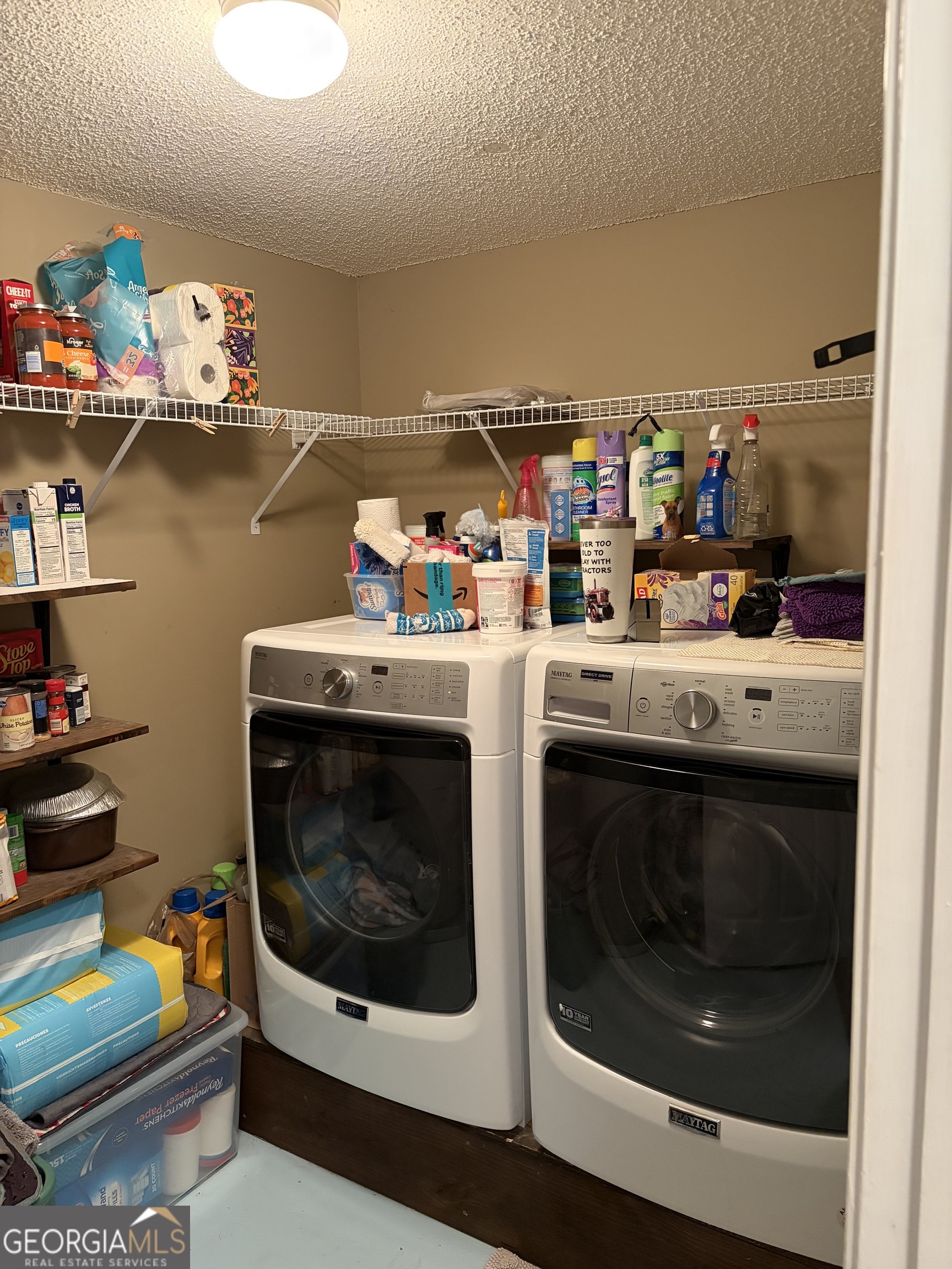 137 Stonebrooke Drive Colbert, GA 30628 - Photo 33 of 47 a utility room with dryer and washer