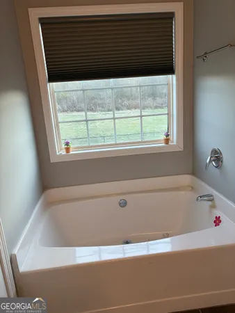 a bathroom with a bathtub