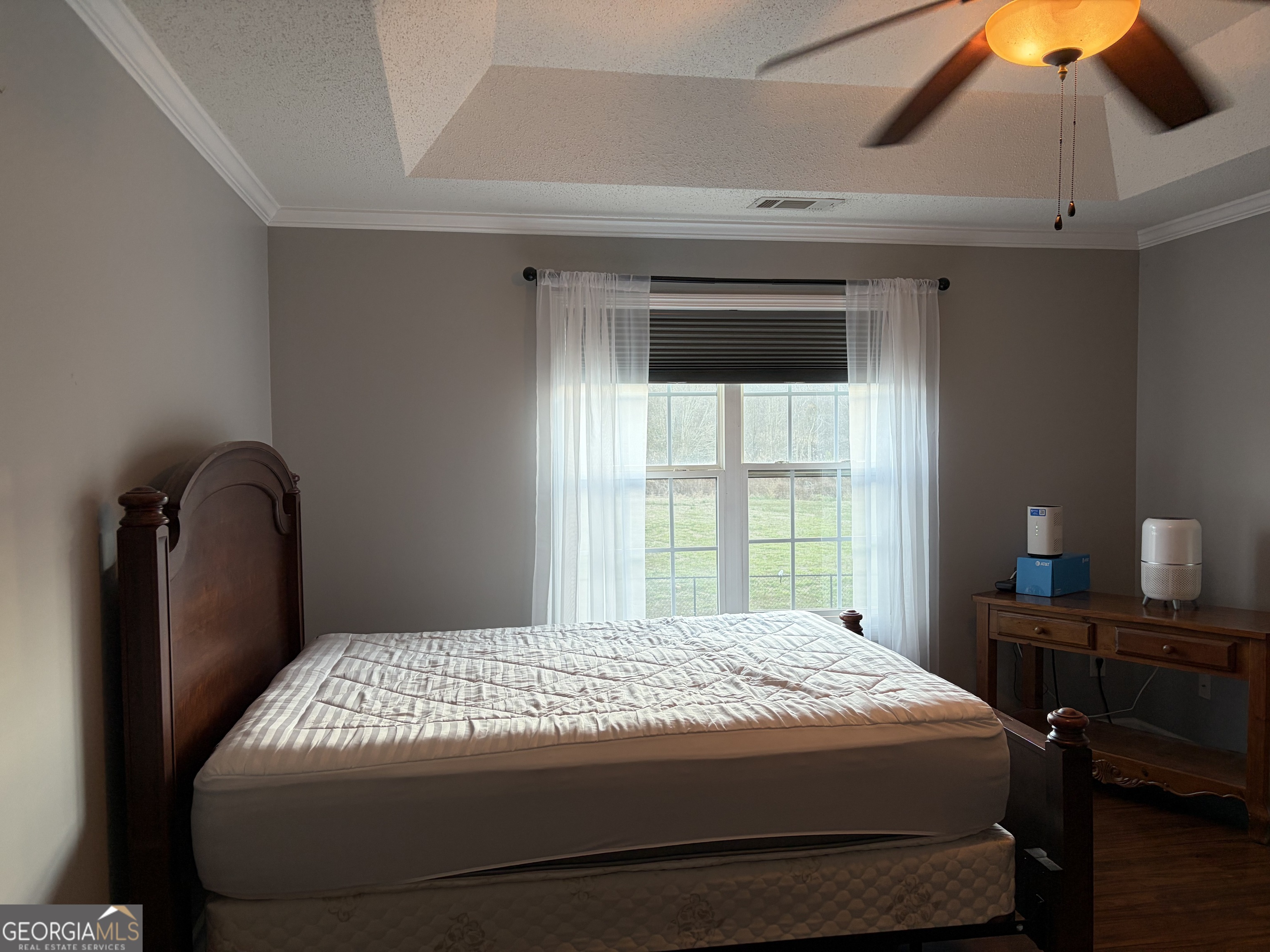 137 Stonebrooke Drive Colbert, GA 30628 - Photo 38 of 47 a bedroom with a bed and a window