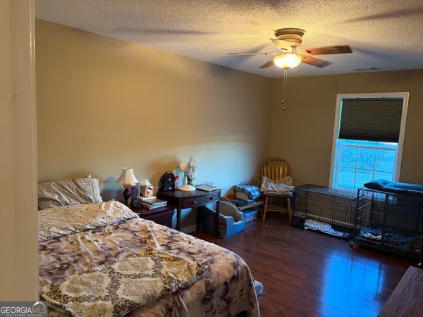a bed room with a bed and a fish tank