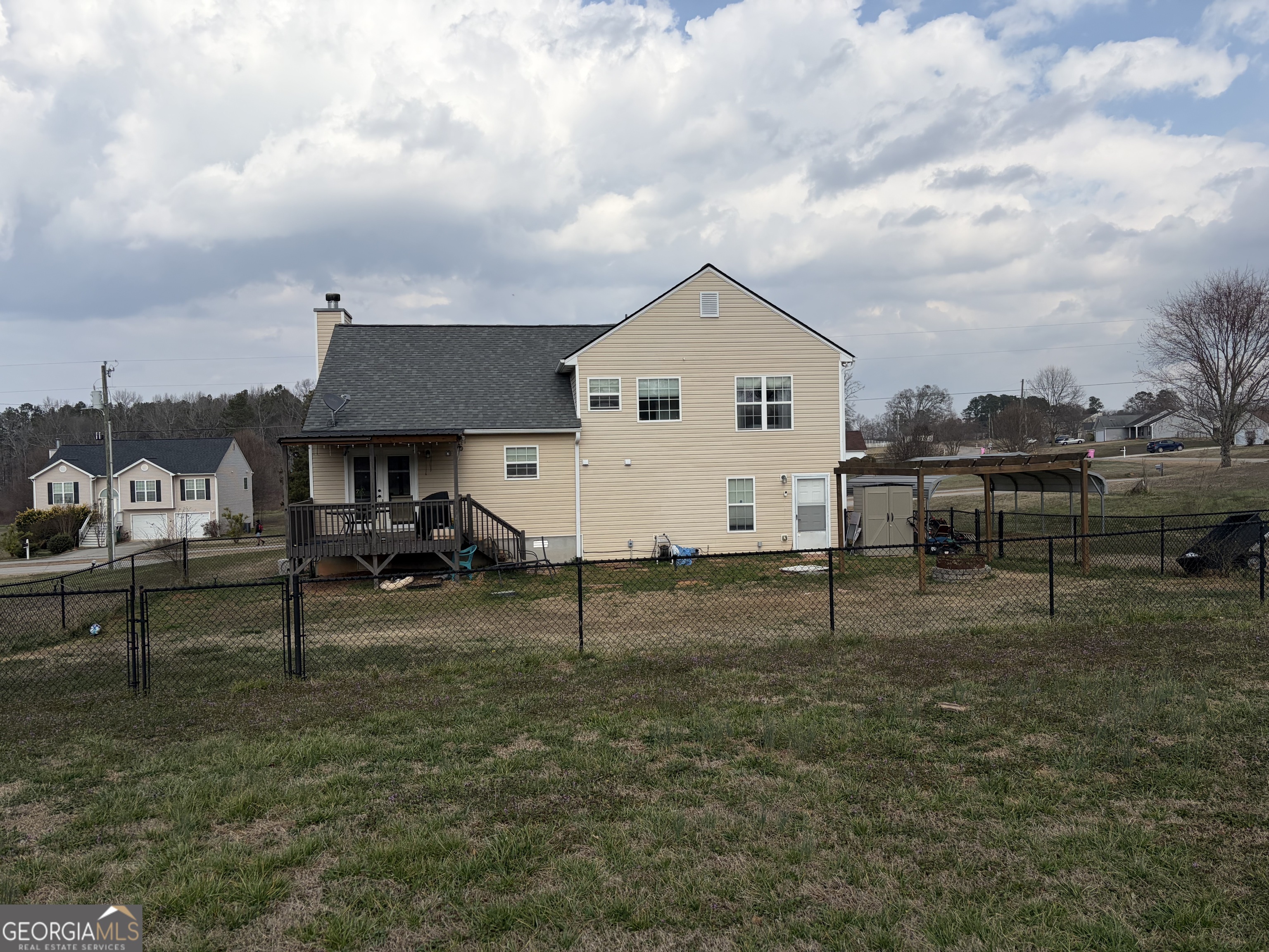 137 Stonebrooke Drive Colbert, GA 30628 - Photo 5 of 47 a view of a house with a yard