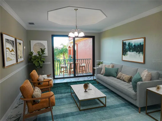 a living room with furniture ceiling fan and a window