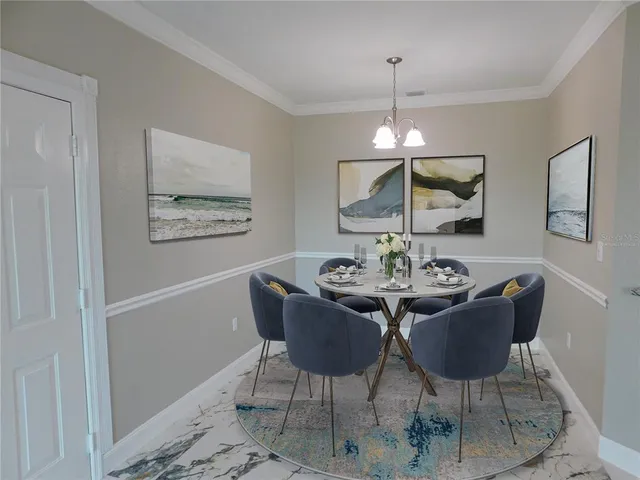a dining room with furniture and window