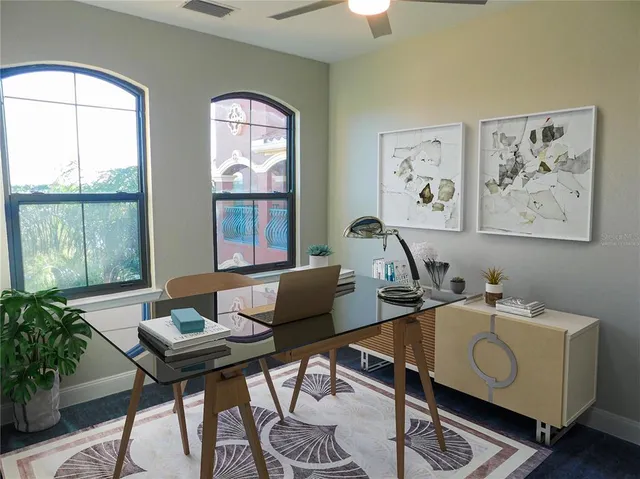 a living room with furniture and window