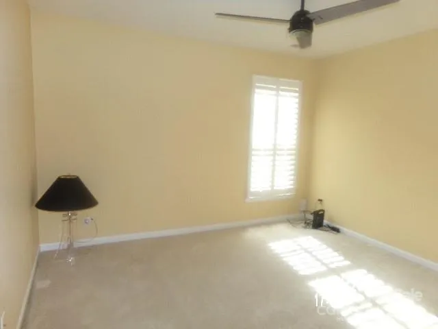 a bathroom with a sink a tub and mirror