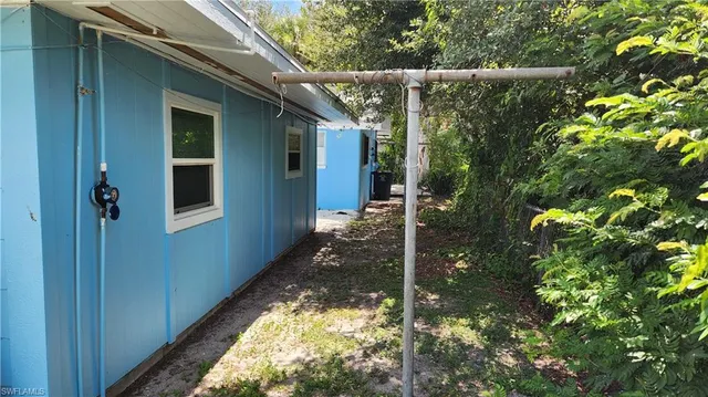 a backyard of a house with lots of green space
