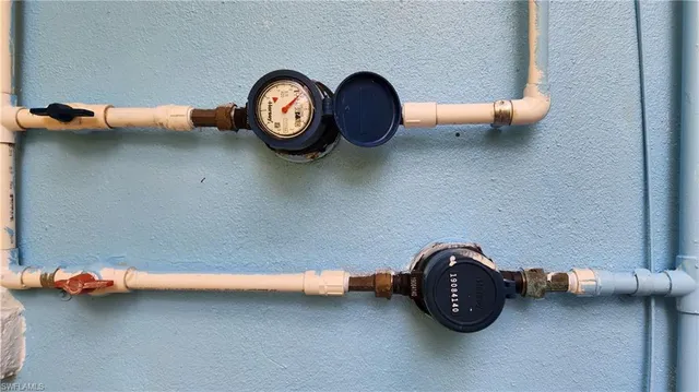 a view of a room that has a table and a chair