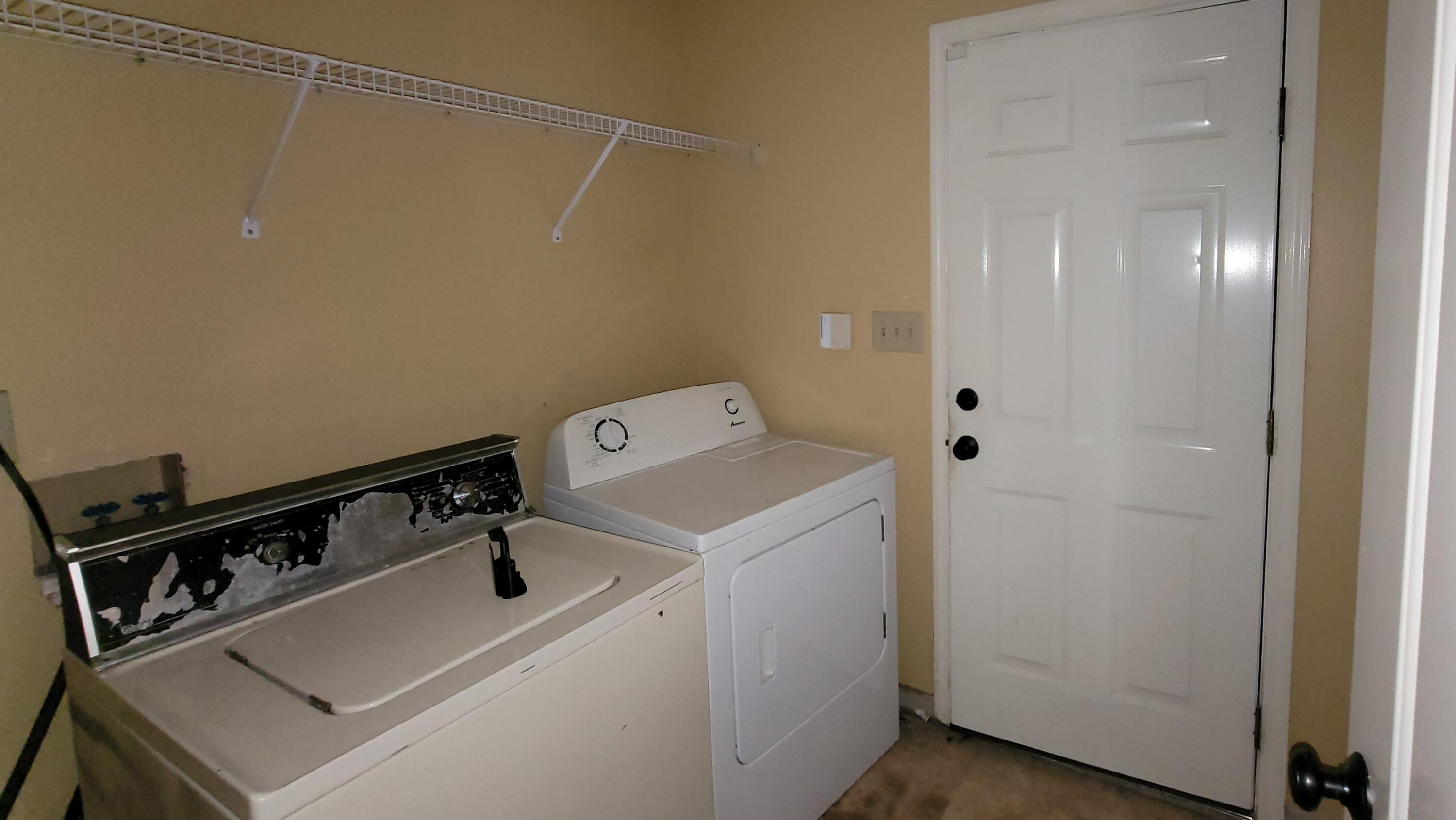 4314 Aintree Road Hephzibah, GA 30815 - Photo 11 of 16 laundry room with door to carport