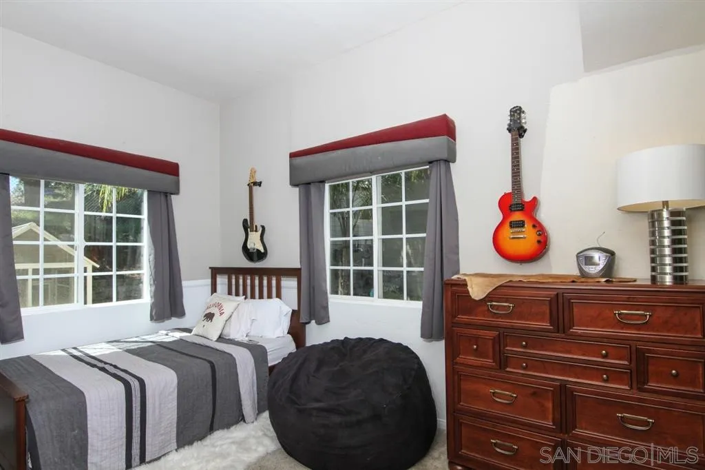 800 South Grade Road Alpine, CA 91901 - Photo 13 of 25 a bedroom with a bed and a window