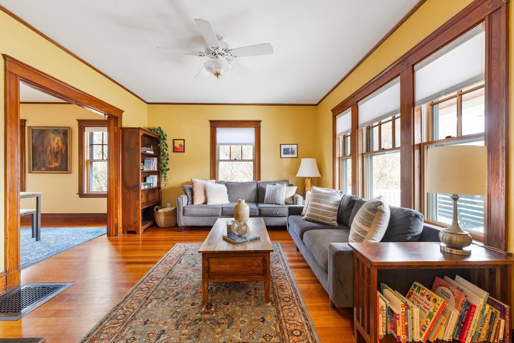 20 Marion Street Natick, MA 01760 - Photo 11 of 39 a living room with furniture and a large window