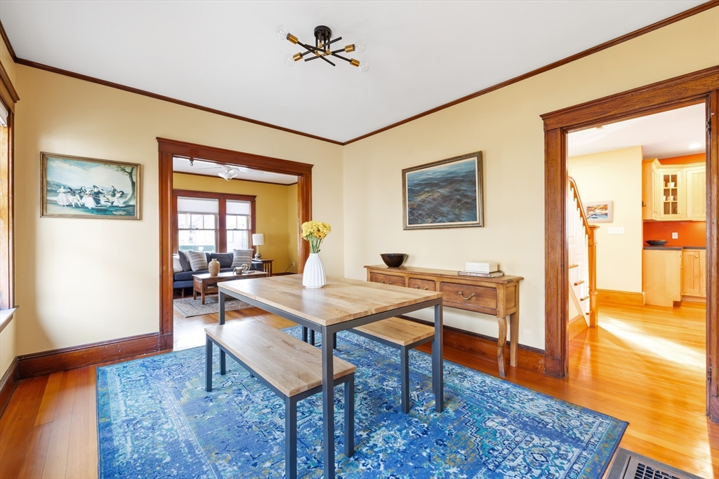 20 Marion Street Natick, MA 01760 - Photo 12 of 39 a view of a livingroom with furniture and a dining table