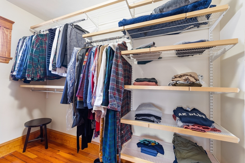 20 Marion Street Natick, MA 01760 - Photo 19 of 39 a view of walk in closet with clothes and shoes