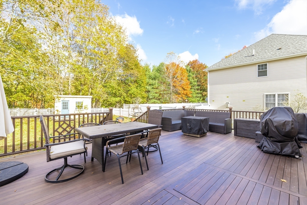 20 Marion Street Natick, MA 01760 - Photo 29 of 39 a outdoor dining space with furniture and wooden floor