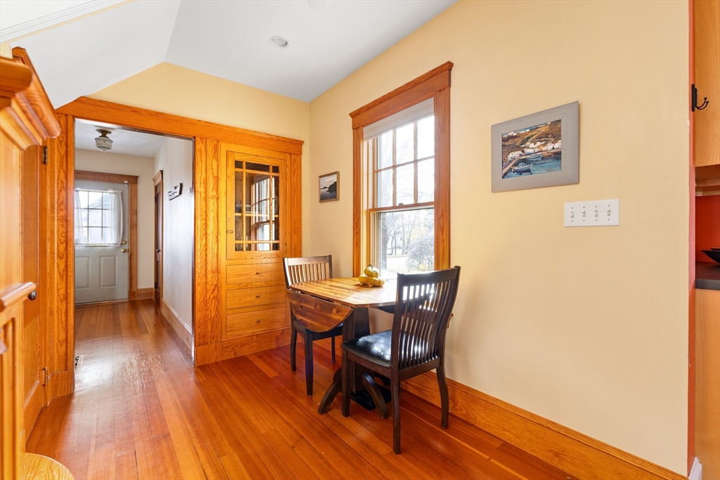 20 Marion Street Natick, MA 01760 - Photo 7 of 39 a view of a dining room with furniture and wooden floor