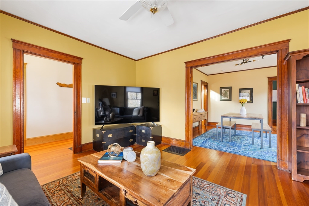20 Marion Street Natick, MA 01760 - Photo 10 of 39 a living room with furniture and a flat screen tv