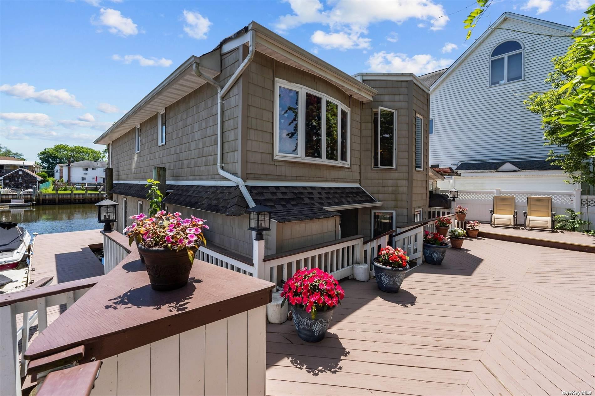 a view of a chairs and table in the patio