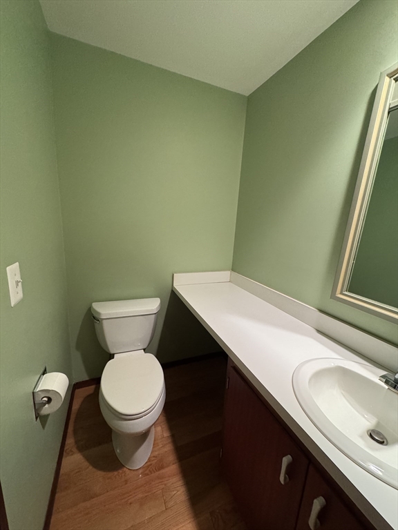 445 Old Stone Brook, Unit 445 Acton, MA 01718 - Photo 6 of 16 a bathroom with a sink and a toilet