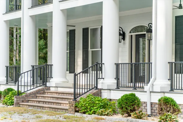 a view of a hallway with windows